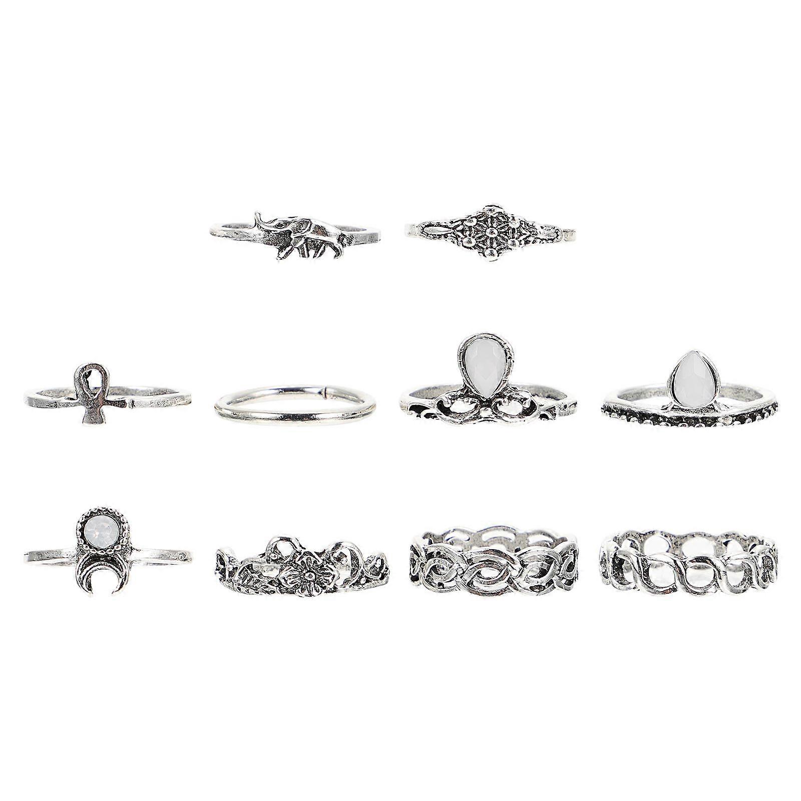 Here's a refined and appealing product description for your **10pcs Retro Alloy Finger Rings Set**:

 

**10pcs Retro Alloy Finger Rings Set for