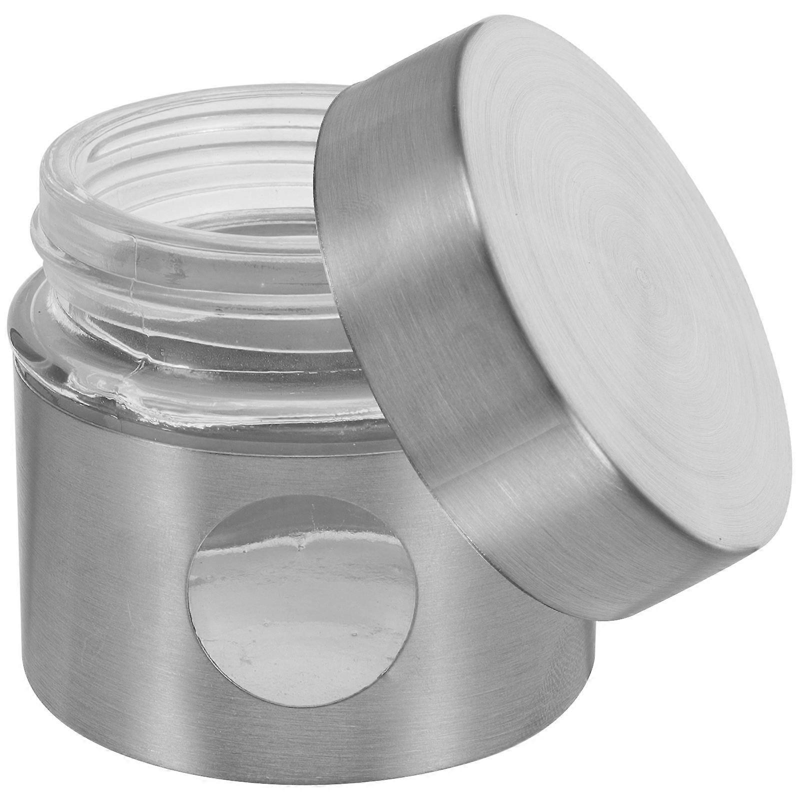 The **Portable Stainless Steel Tea Canister with Window Airtight Glass Storage Jar** is a versatile and stylish container designed for storing tea,