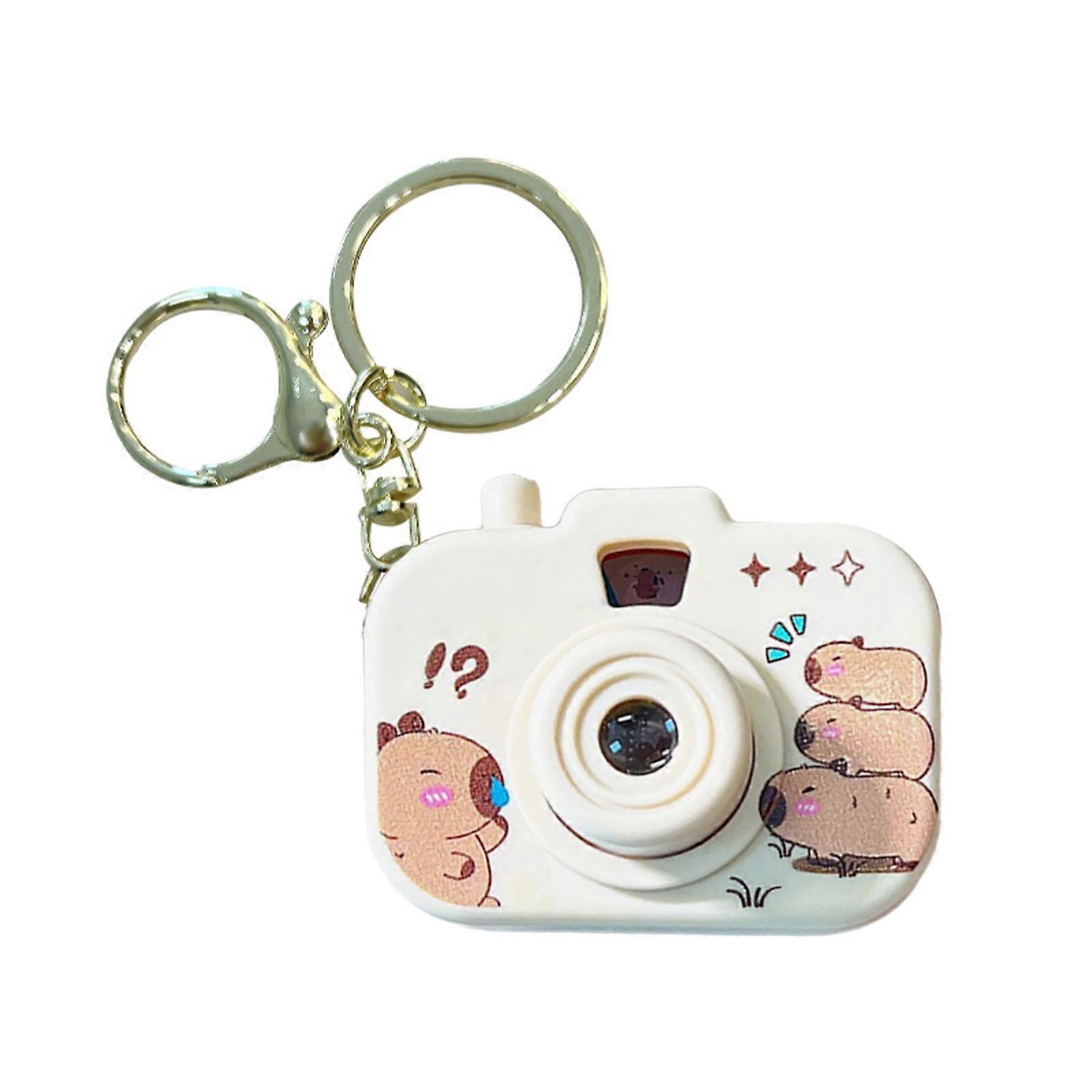 Porte-clés caméra à projection Capybaras créatif avec mini projecteur intégré pour adultes et fans d'anime - Multicolore