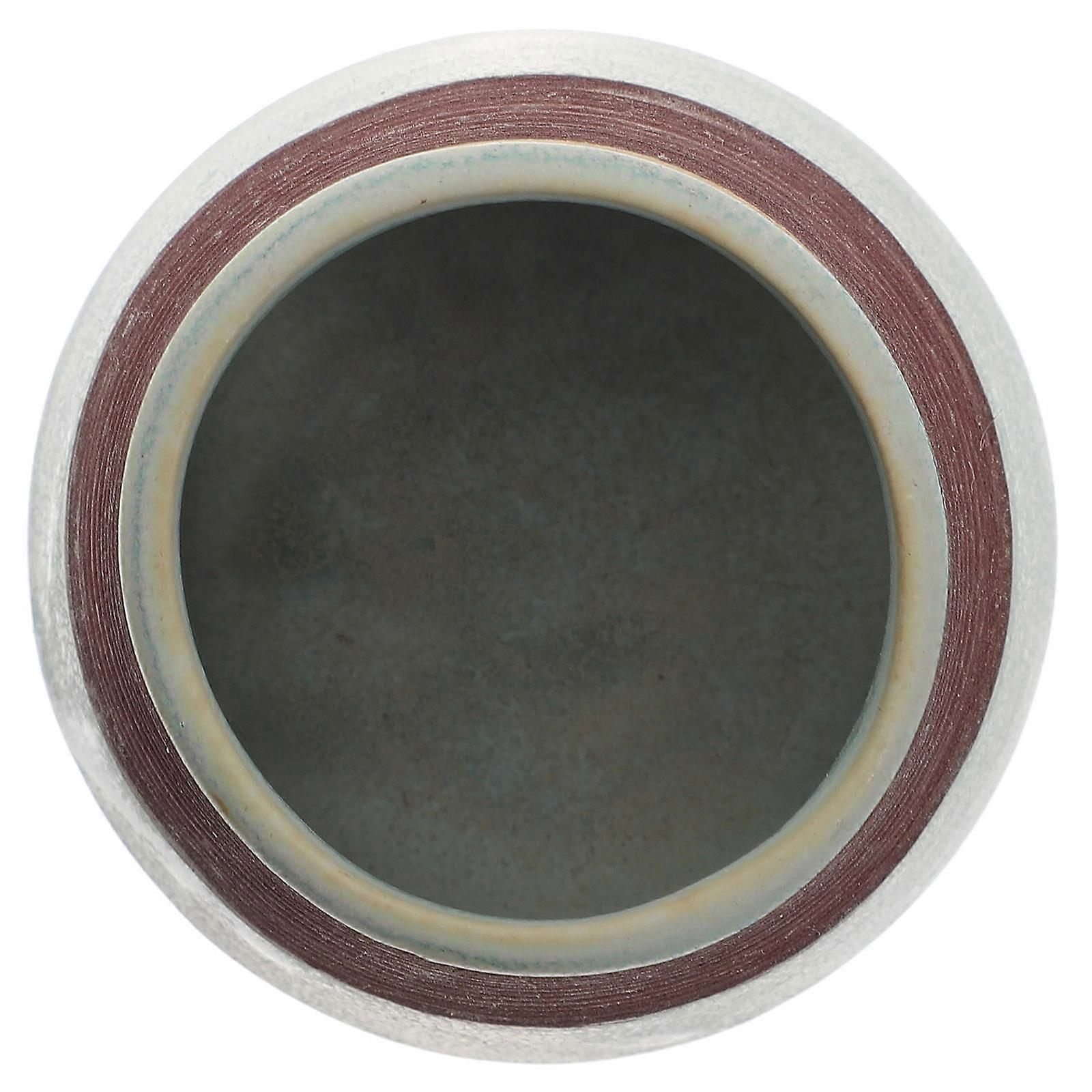 Compact Ceramic Jar with Match Striker, Designed for Convenience and Style