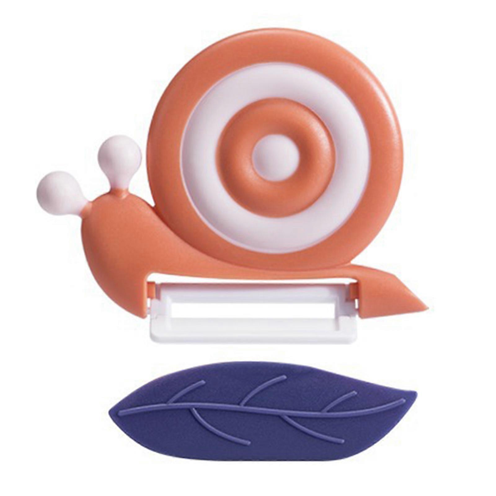 Snail Shape Ceramic Peeler Featurie A Cutter And Antislip Handle Efficient Tool For Safe And Quick Peeling  orange color