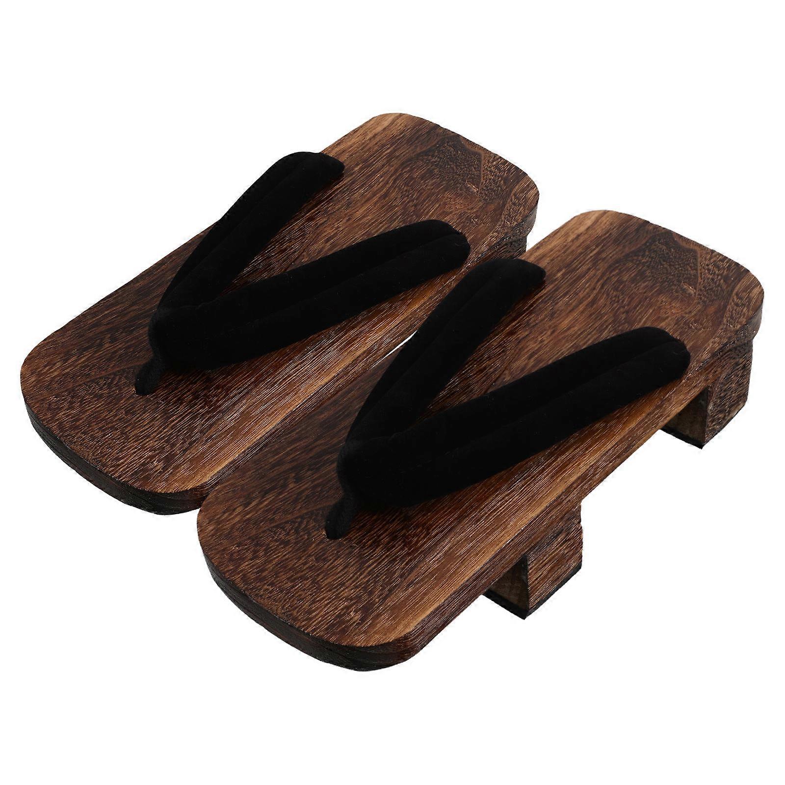 **Traditional Japanese Wooden Clogs Slippers** are a stylish and cultural footwear choice that blends functionality with elegance. These slippers,