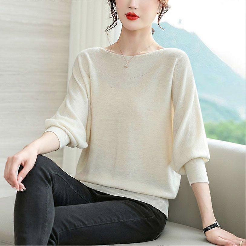 Top aderente e dimagrante da donna con un maglione lavorato a maglia autunno e inverno con una manica a pipistrello con un collo