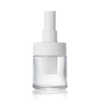 Oil Bottle and Brushwhite