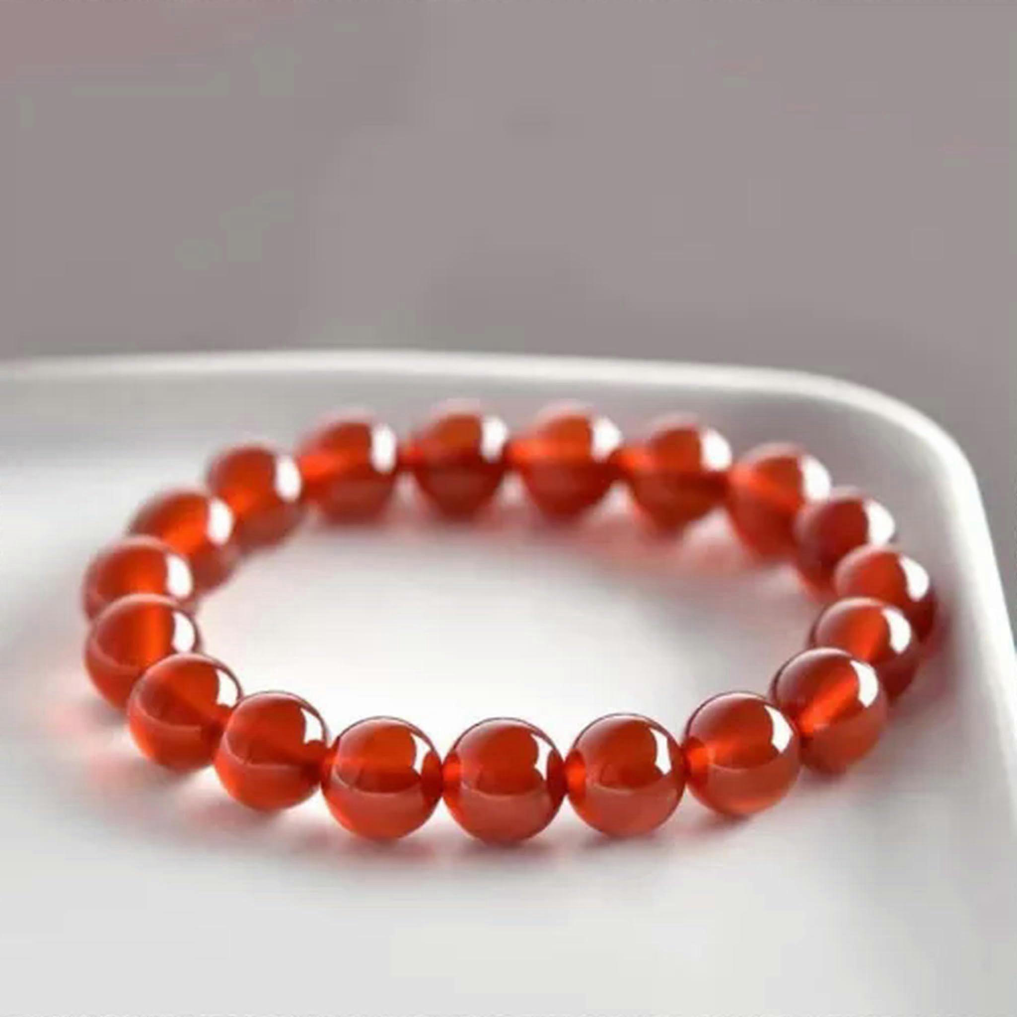 Bracelet made of natural carnelian beads, smooth, round, sphere, gemstone, elastic cord, 10 mm