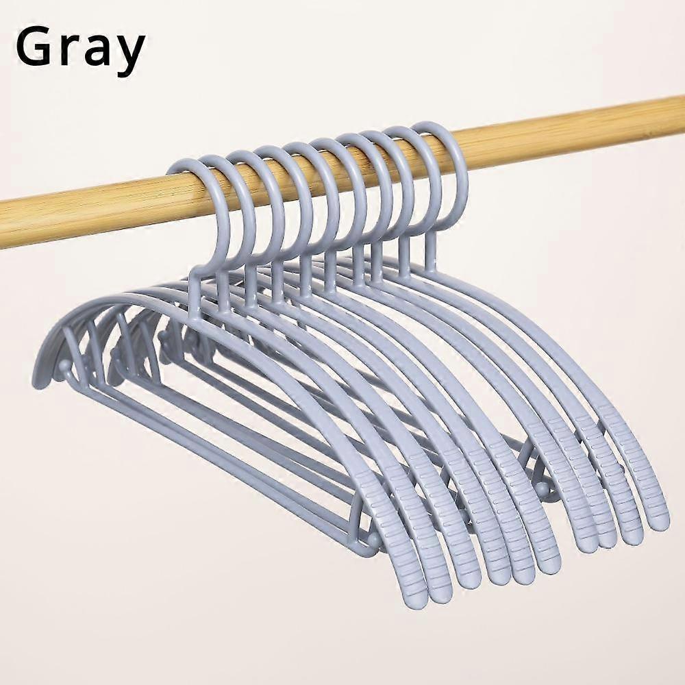 10Pcs / 20Pcs Cintres en plastique antidérapant sans couture Cintres sans trace Demi-cercle Cintres Séchage Porte-vêtements coupe-vent