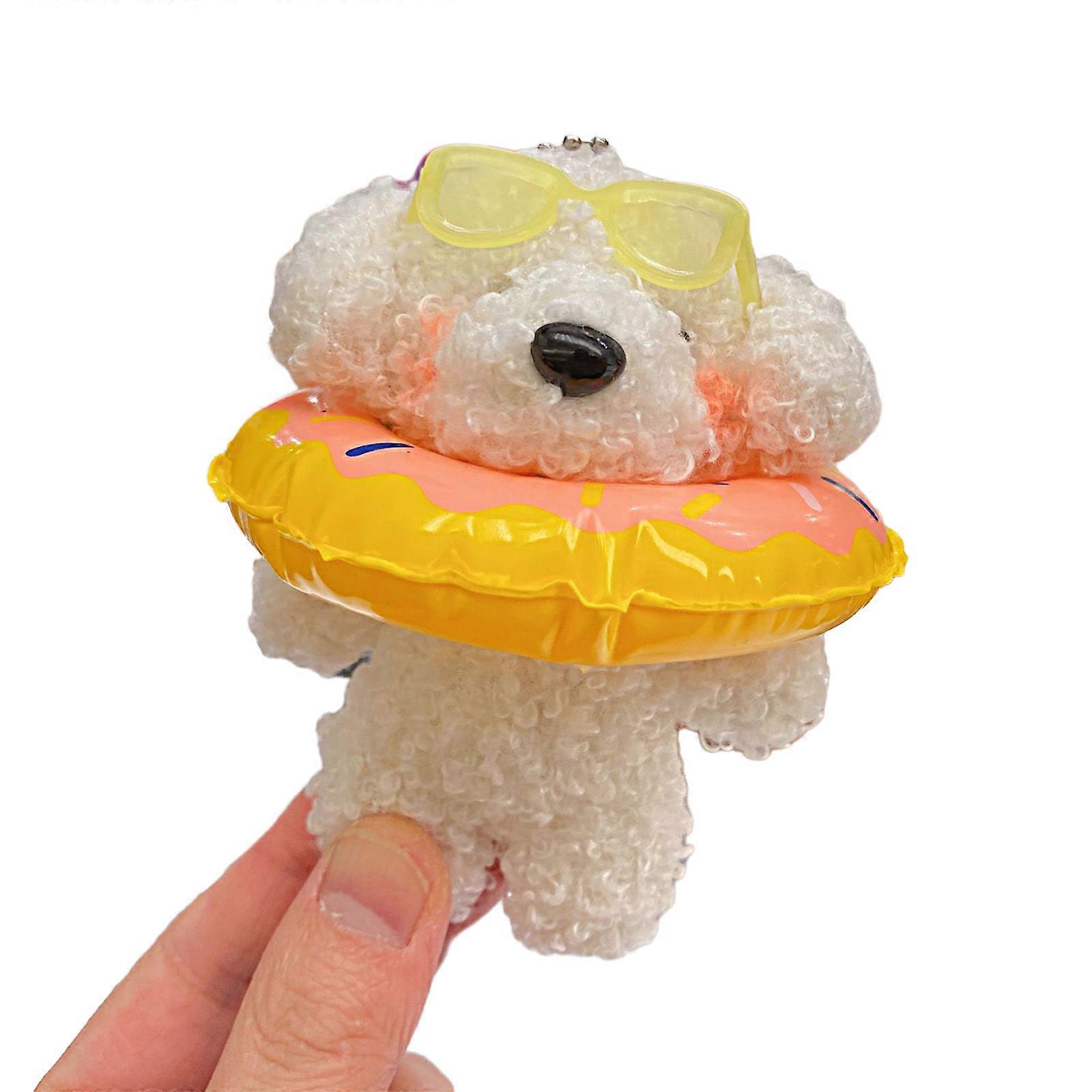 Suloinen koiran avaimenperä söpö avaimenperä yksinkertainen miniatyyri koiran avaimenperä kompakti ja halattava lelu reppuihin ja kukkaroihin keltainen