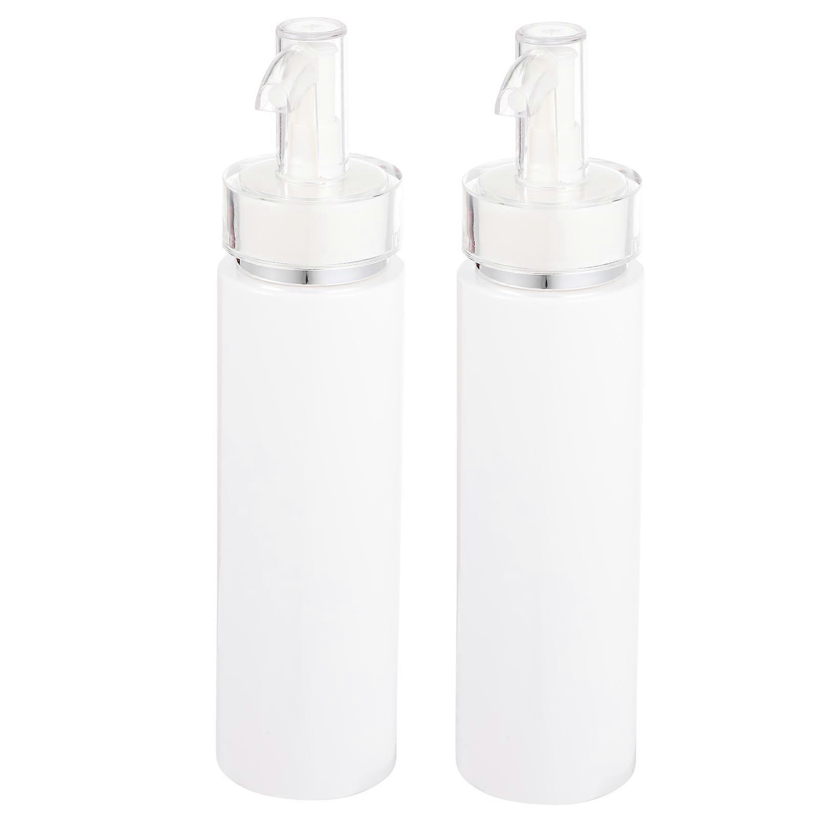 Here's a refined and professional product description for your **2pcs Portable Lotion Pump Bottles**:
### 2 Pack Portable Lotion Pump Bottles –