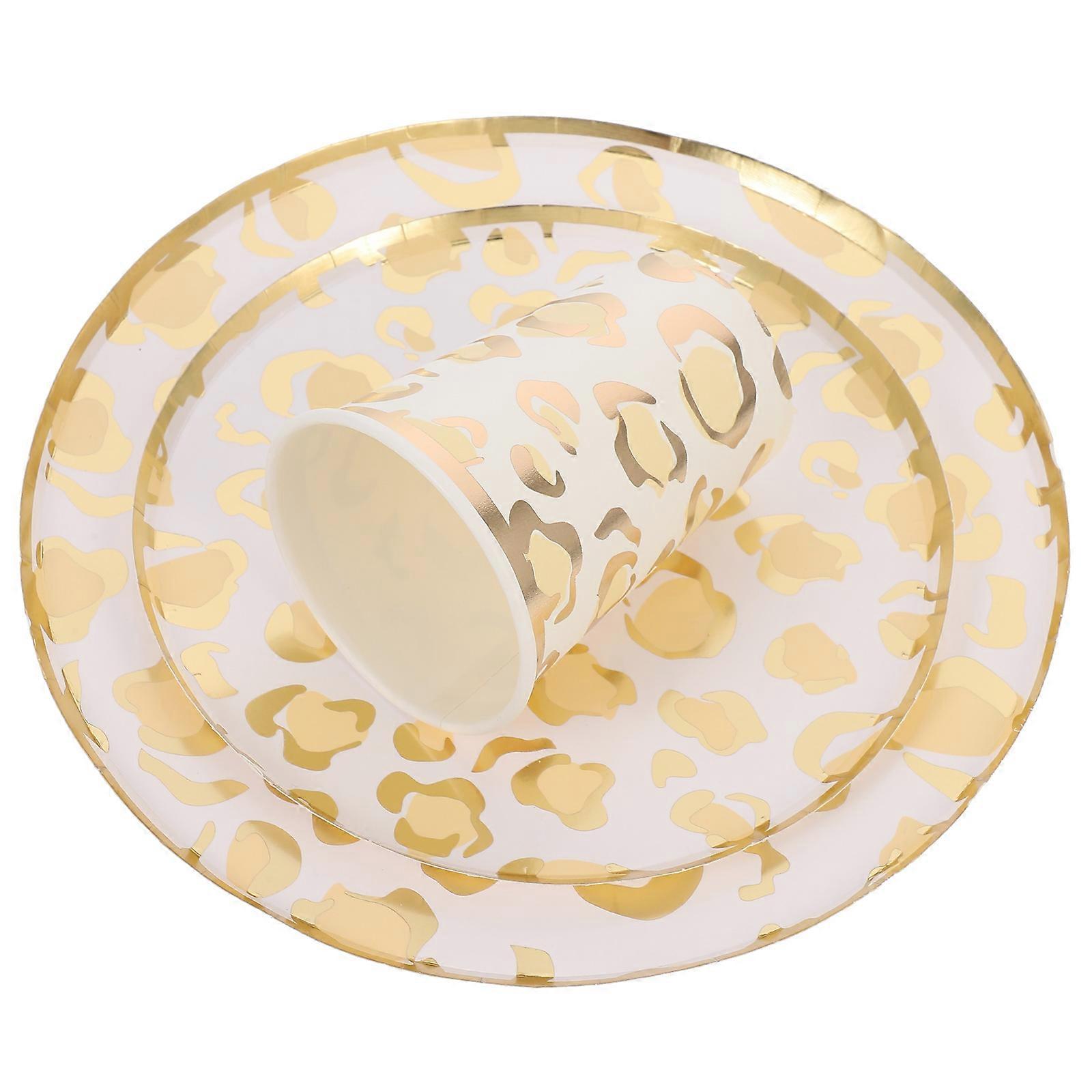 Set per feste con carta dorata e bicchieri