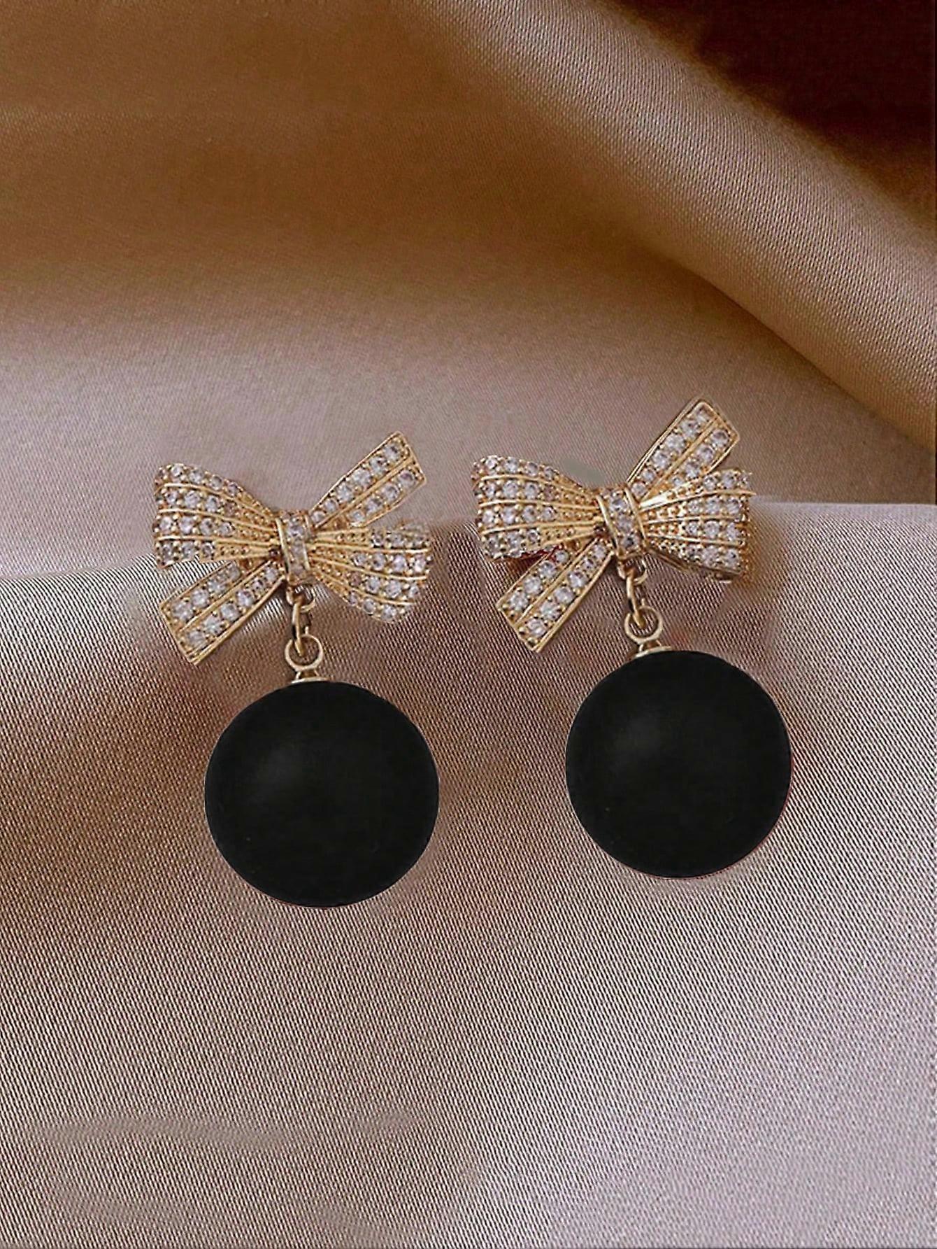 1ペアのファッショナブルなメタルボウ&パールドロップイヤリング、クリスマス、新年パーティーのために着用する女性に適しています