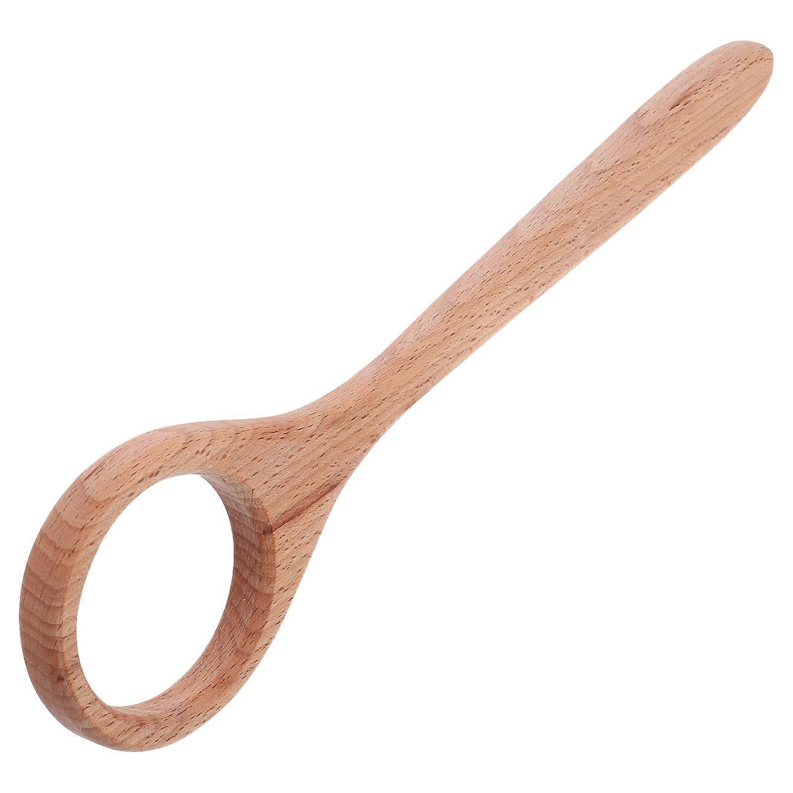 The **Wooden Dough Whisk** is a kitchen utensil designed specifically for mixing and working with dense doughs, such as those used in Danish