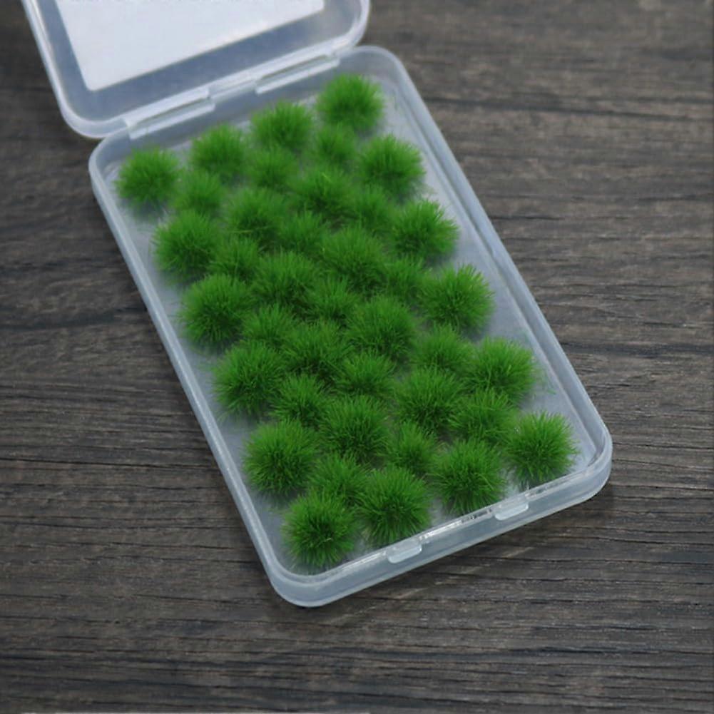 Static green grass tufts, 6 mm in size, ideal for DIY enthusiasts and architectural landscaping.