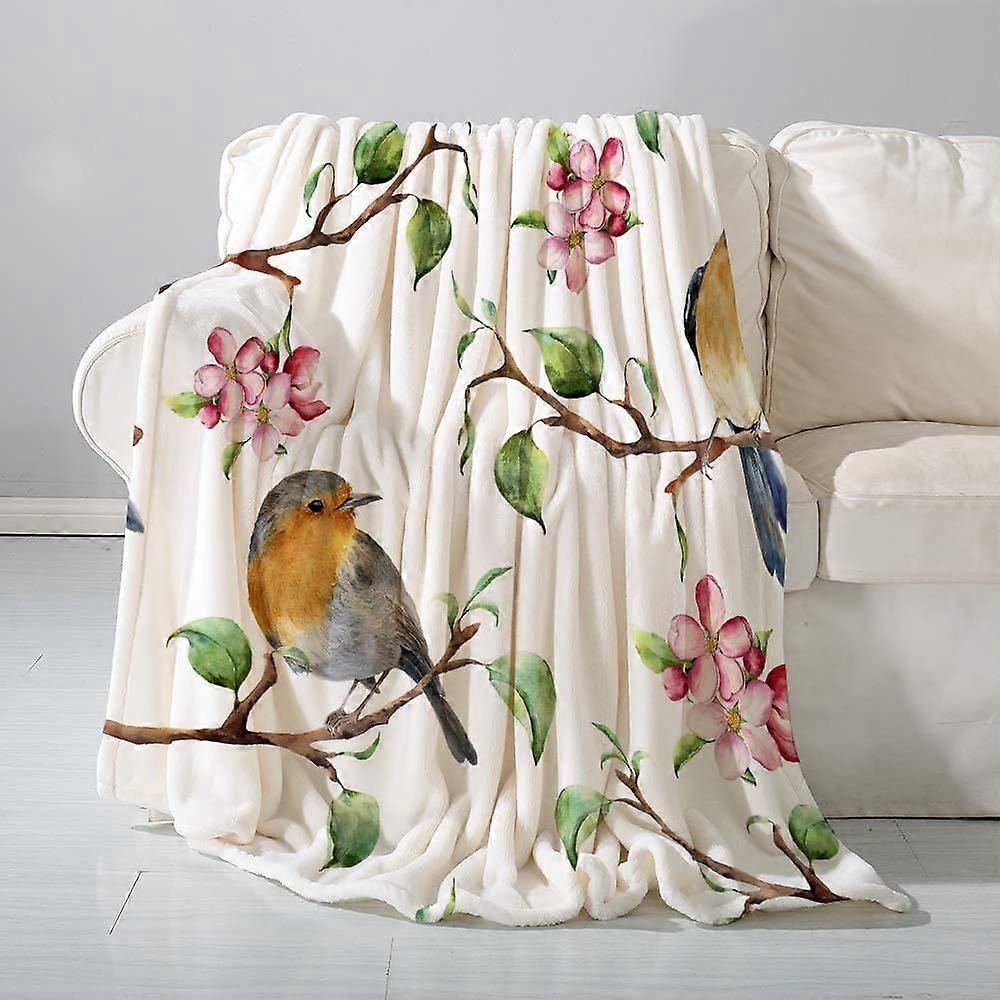 Manta de flanela com estampa de pássaros Robin em galho de árvore com flores e folhas da primavera. Ideal para sofá, cama ou quarto. Mede 150 x 200 cm.