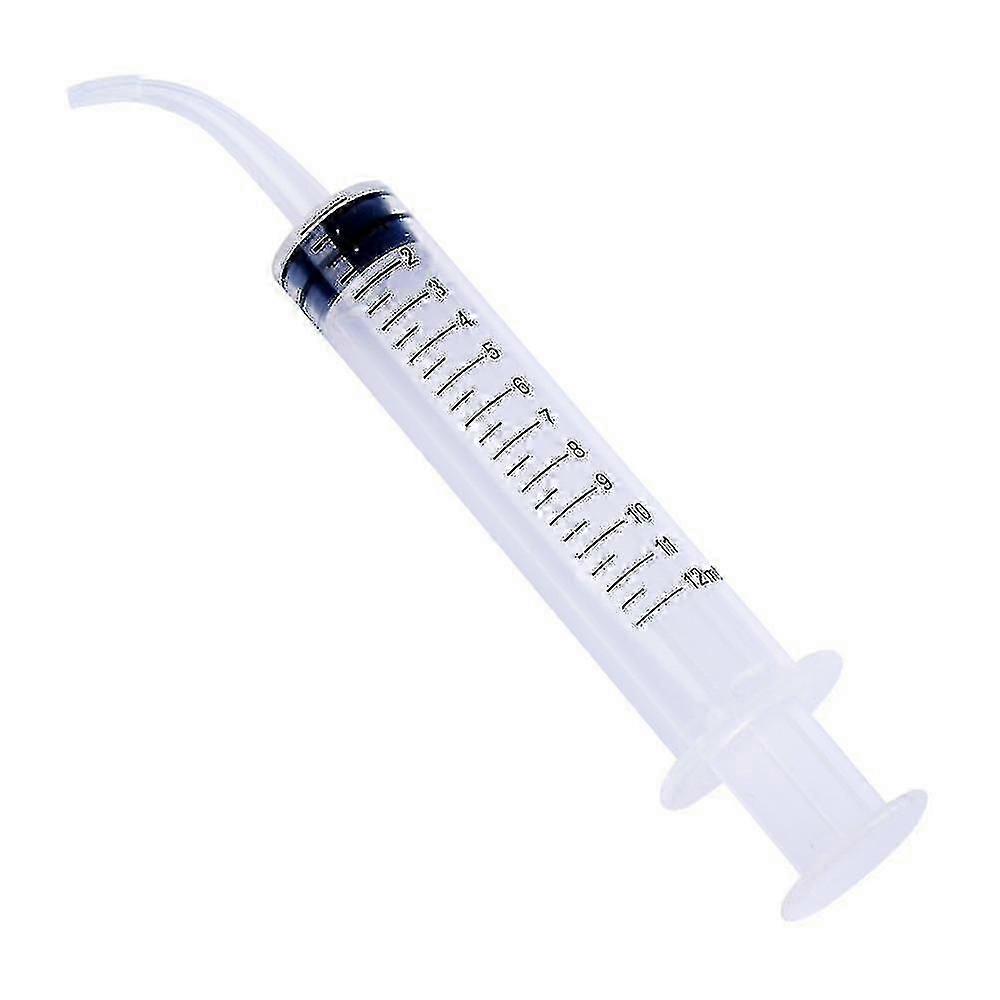 ear irrigation tool with syringe for wax removal