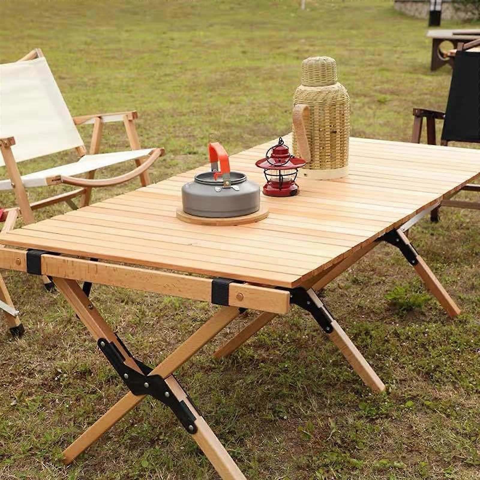 Portable folding wooden table for picnics, camping, barbecues. Allpurpose folding table for outdoor and indoor use.