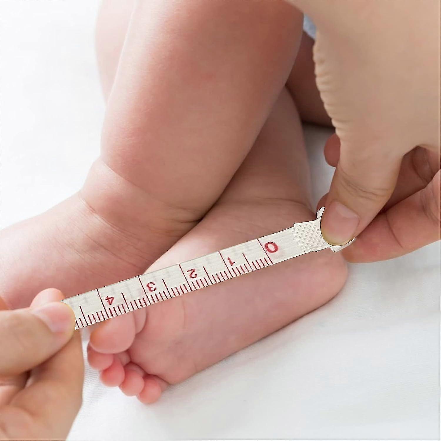 Baby Foot Size Measuring Children's Feet With A Tape Measure