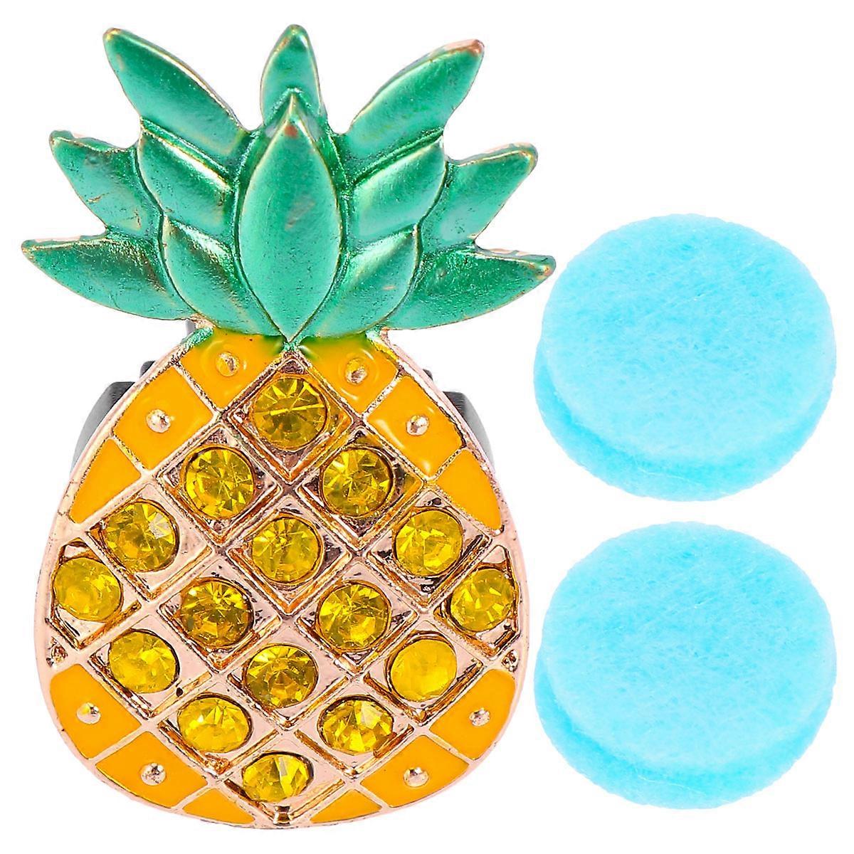 It sounds like you're describing a product listing or looking to for a **Rhinestone Pineapple Car Vent Clip** — a stylish aromatherapy diffuser