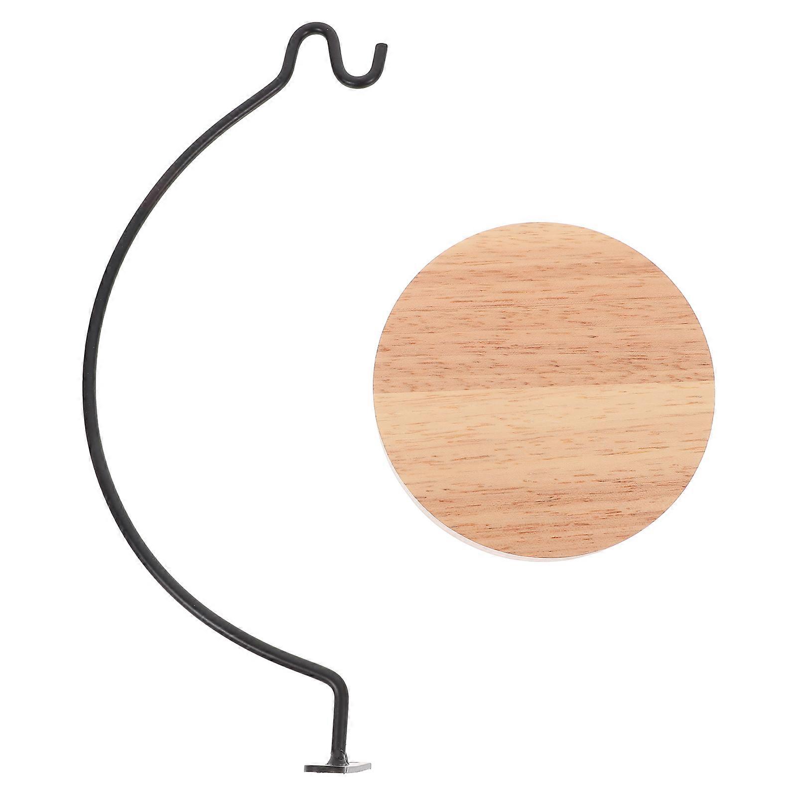 Supporto per piante da interno, in ferro e legno.