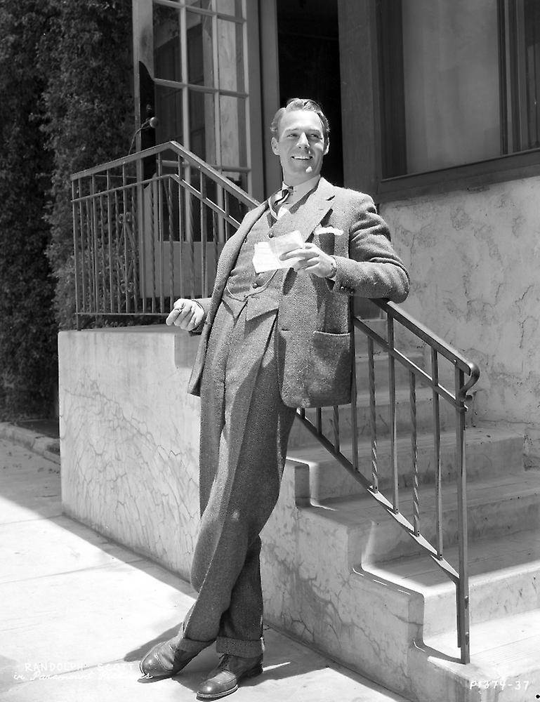 Randolph Scott wearing a suit Poster