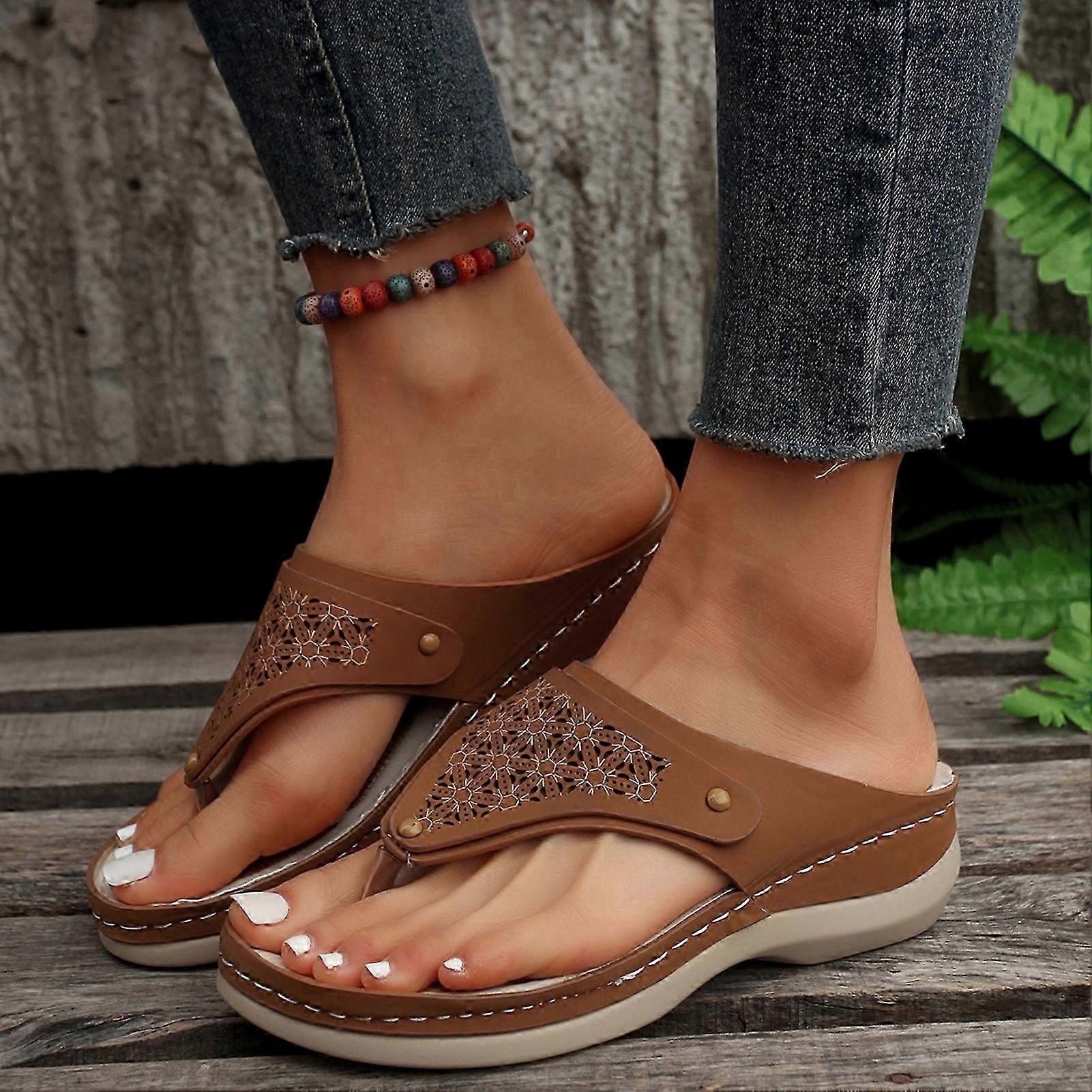 A Woman's Soft Leather, Solid Color Flip-Flop Sandal with an Open-Toe, for Outdoor Walking and Travelling