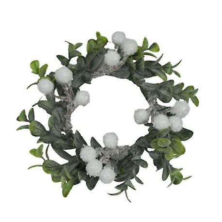 Pillar candle ring with white frosty lingonberries and green lingonberry twigs