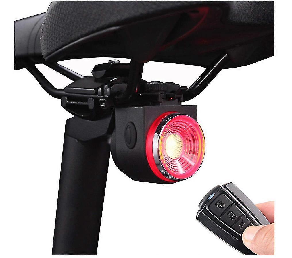 אביזרים לאופניים, אזעקה לאופניים פנס אחורי עם חישת בלם חכמה, נגד גניבה אזעקת אופניים תאורה אחורית עם שלט רחוק, USB פנסי אופניים נטענים (שחור)