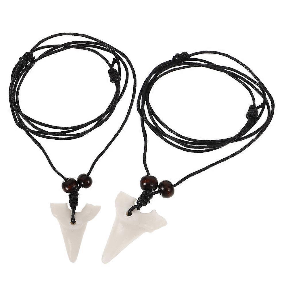 Here's a refined and professional product description based on your input:
 
**2pcs Shark's Tooth Charm Pendant Necklace – Unisex Fashion Accessory