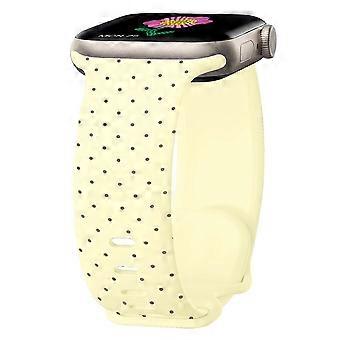 Correa de reloj de silicona de color sólido con cierre de mariposa y textura de pequeños puntos.