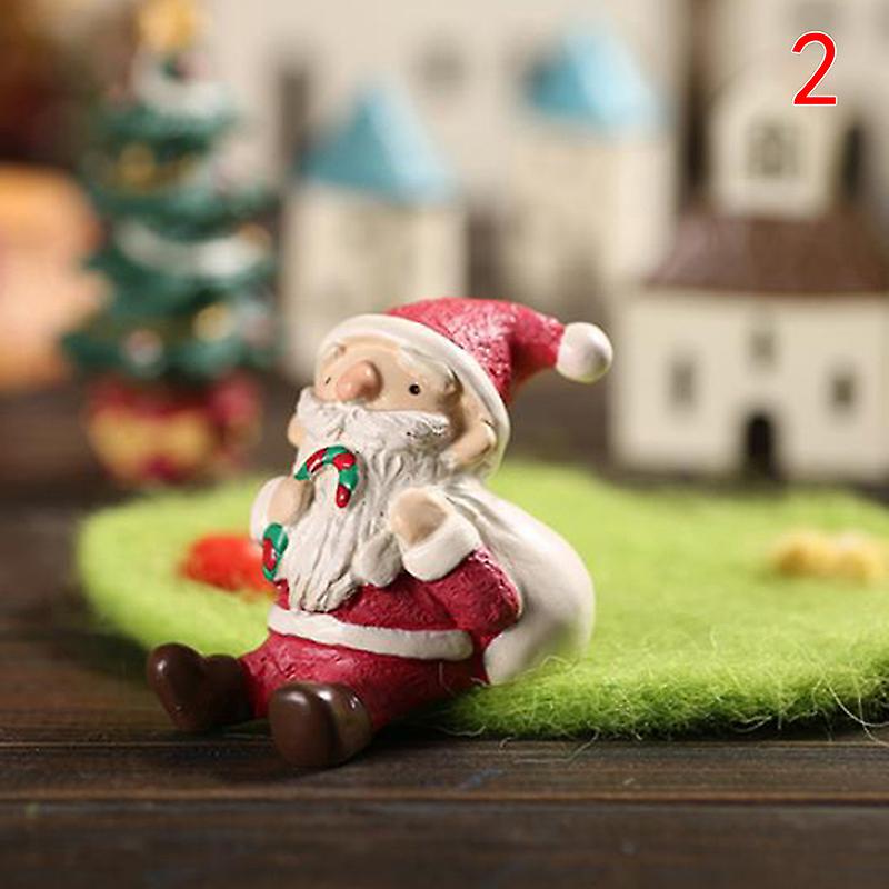 Coloriage De Noël Avec Le Père Noël Et Ses Lutins Emballant Des Cadeaux