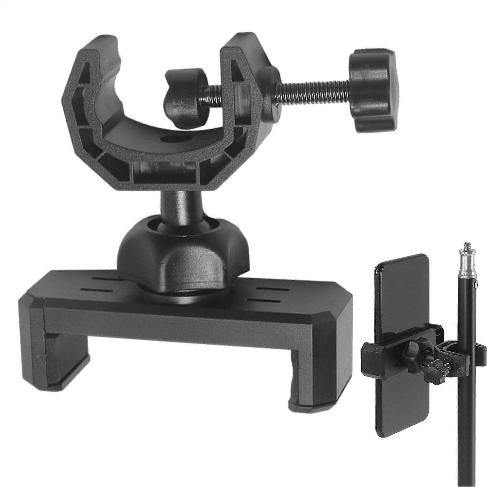 Attach the phone to the tripod mounting adapter, the 360degree tripod adapter of the stand. The phone clamp can rotate 360 degrees. Phone clip.