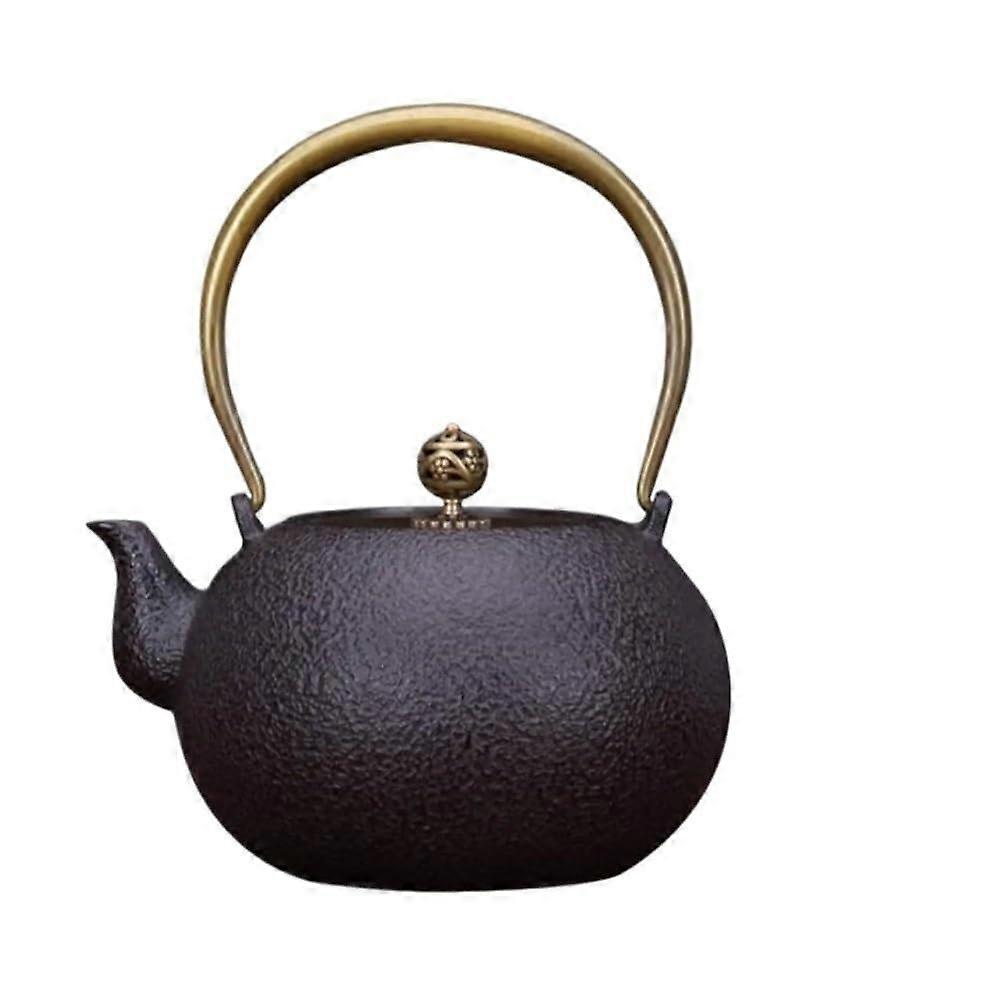 Traditional teapot made of cast iron for loose tea, fast boiling, stove, rustresistant, heatresistant handle, durable design, elegant gift