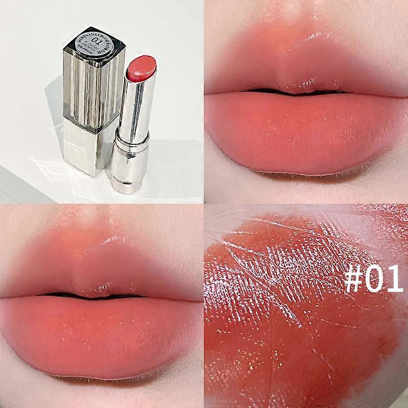 Whispers Between Lips Lip Magic Lipstick: Clear, moisturizing, glossy, mirror-like finish for plump lips, and doesn't easily transfer.