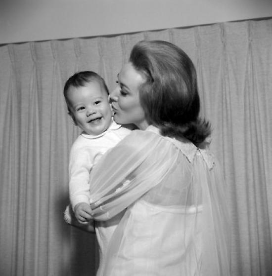 Mother caressing baby Poster