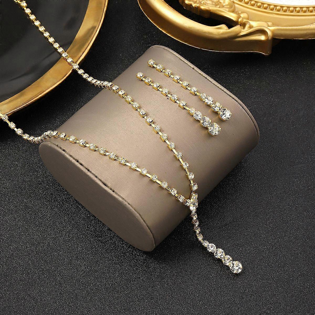 Set di collane e orecchini da sposa con cristalli di moda Source