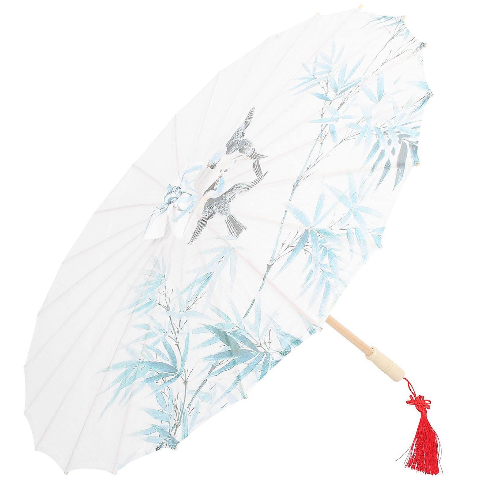 It sounds like you're describing or searching for a **vintage Chinese oiled umbrella**—a beautiful and traditional decorative item often used in