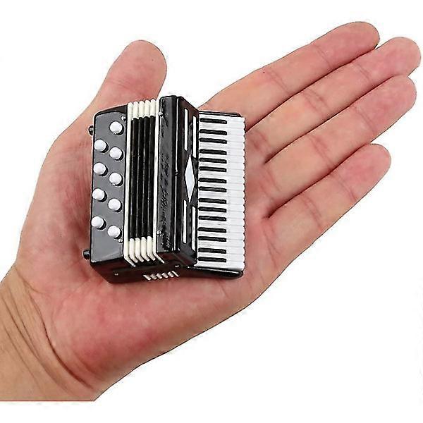 Miniature accordion with box, mini instrument replica, collectible.