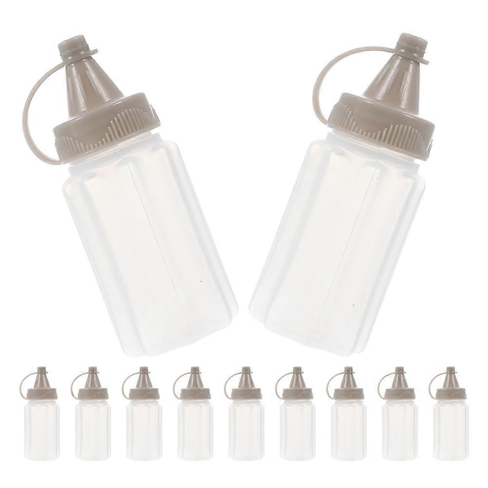 12 Pack Reusable Squeeze Bottles Leakproof Condiment Dispenser with Precision Nozzle for Sauces, Dressings & Camping