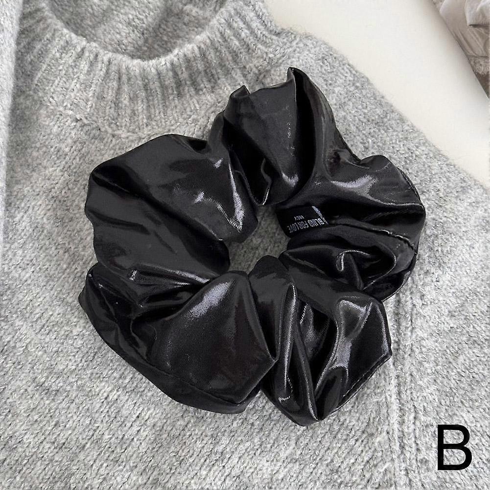 Tecido brilhante prateado círculo do intestino grosso