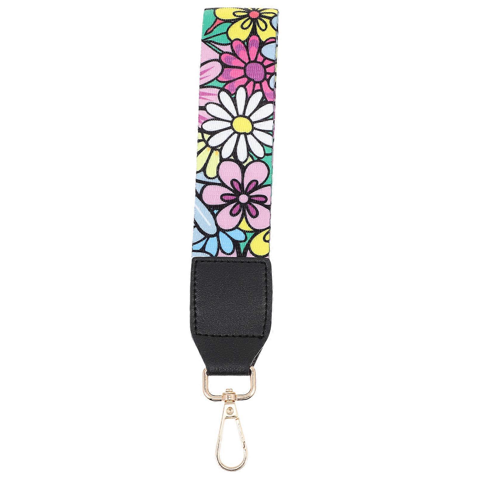 It looks like you're referring to a product description for a **Delicate Flower Handbag Wrist Strap / Creative Lanyard**. This type of accessory is