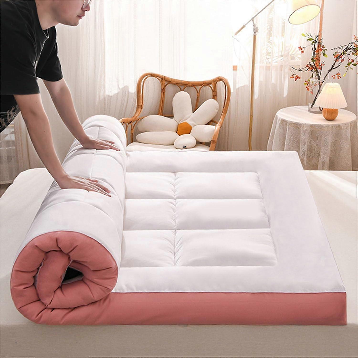 Japanese futon mattress topper, extra thick, foldable, rollable, for guest bed, white and pink, 200 x 220 cm.
