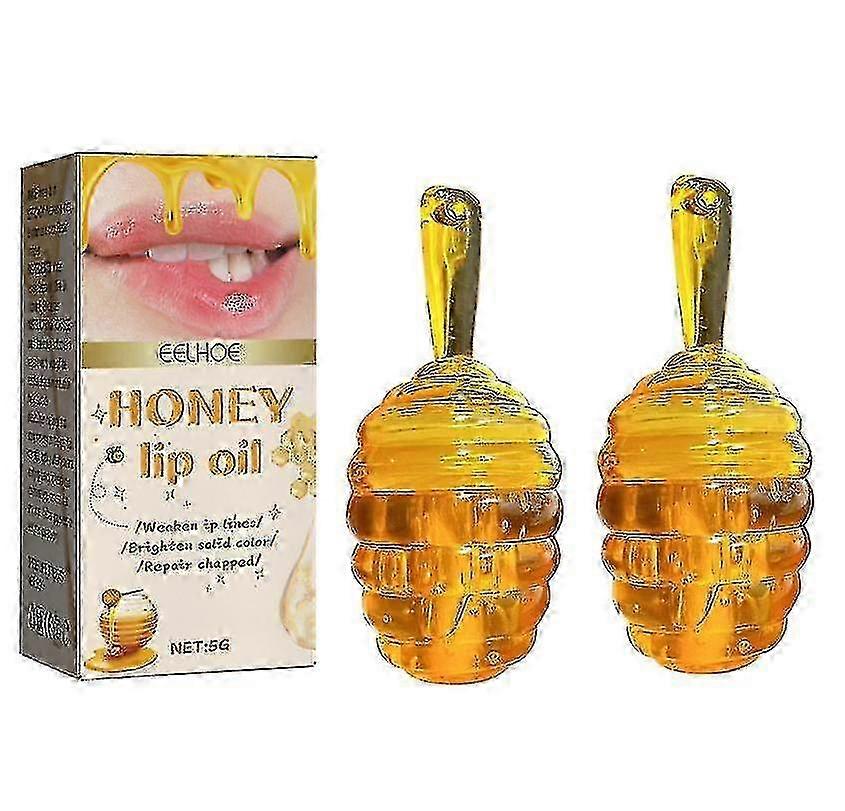 ハニーリップオイルは、リップラインを希釈し、肌の荒れを防ぎ、唇のケア、保湿、Cをケアします