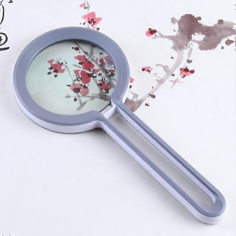 Hand-Held Magnifying Glass