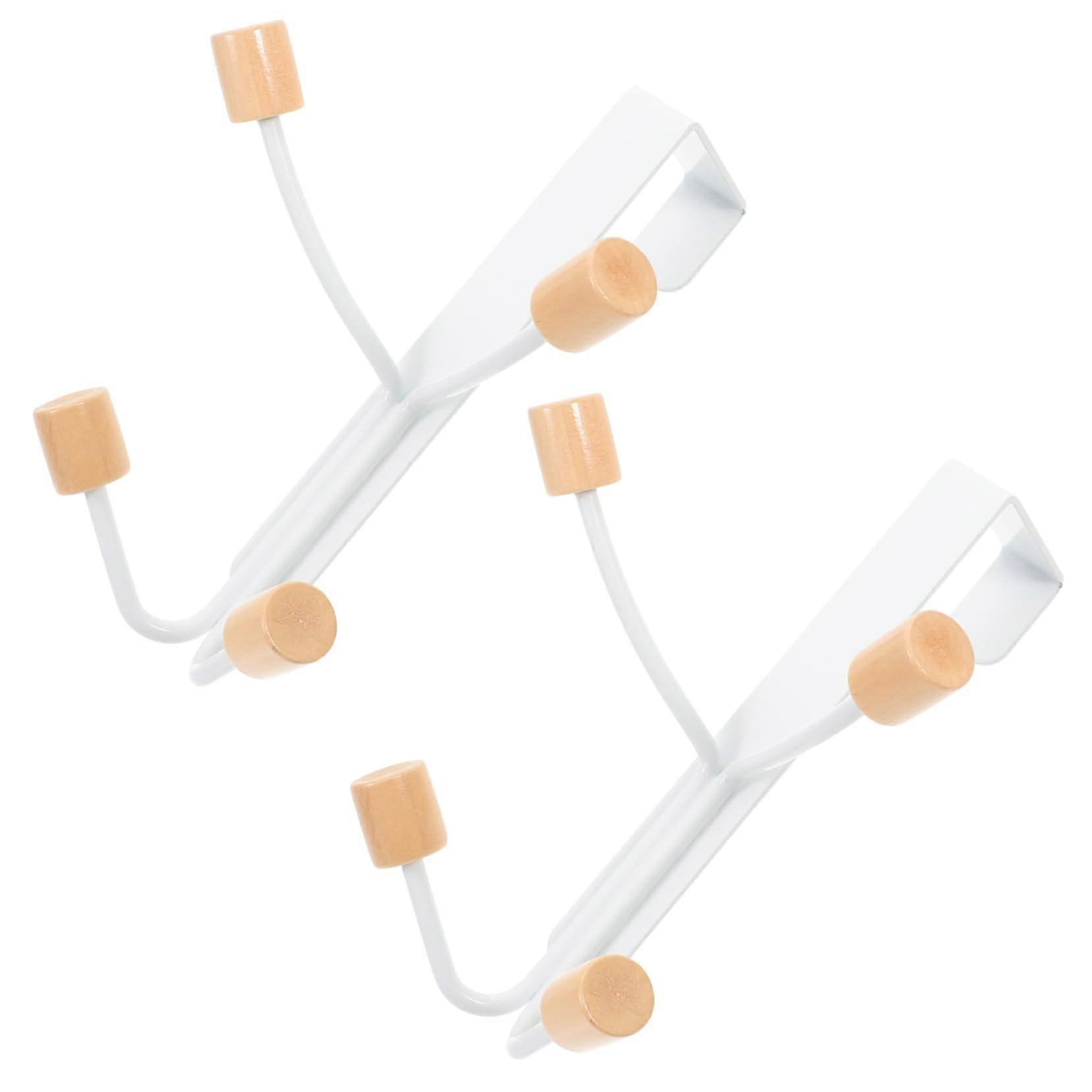 2 x punch coat hooks made of door hangers for, for storing clothes and towels in the bathroom.