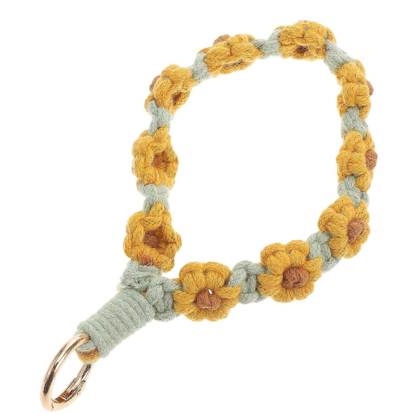 It sounds like you're describing a **Boho style handmade accessory** that combines elements of a **keychain, wristlet, bracelet, and bag charm** — a