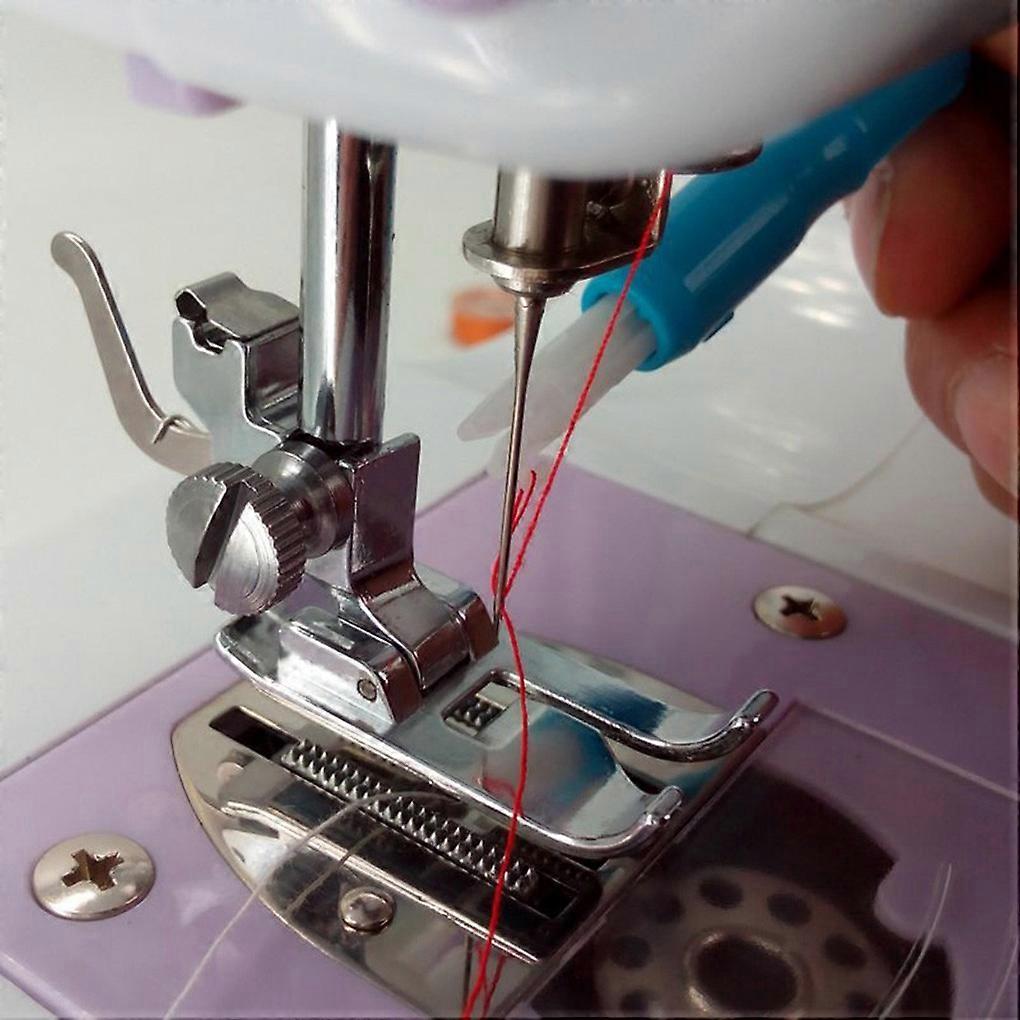 Needle threader, needle replacement, sewing tools, threading, beautiful brown.
