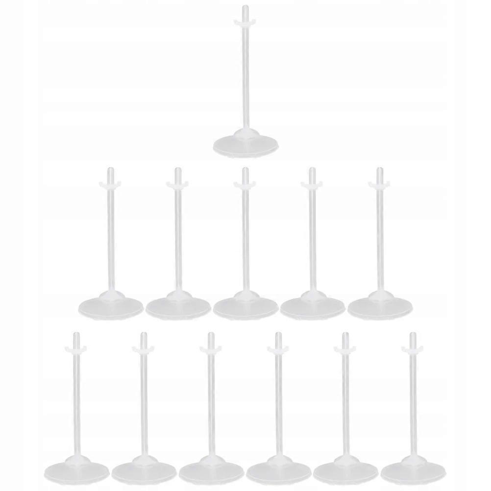 A Stand For Doll Figures That Is Transparent