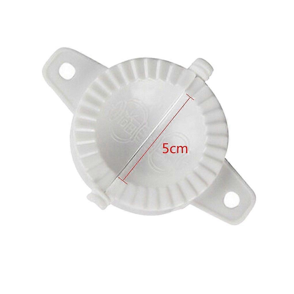 Two plastic dough dumpling pie molds