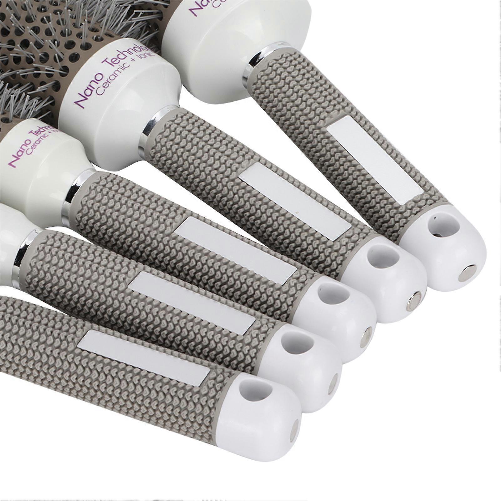 Set of 5 heat conduction round brushes, combs and styling tools for blow drying and curling