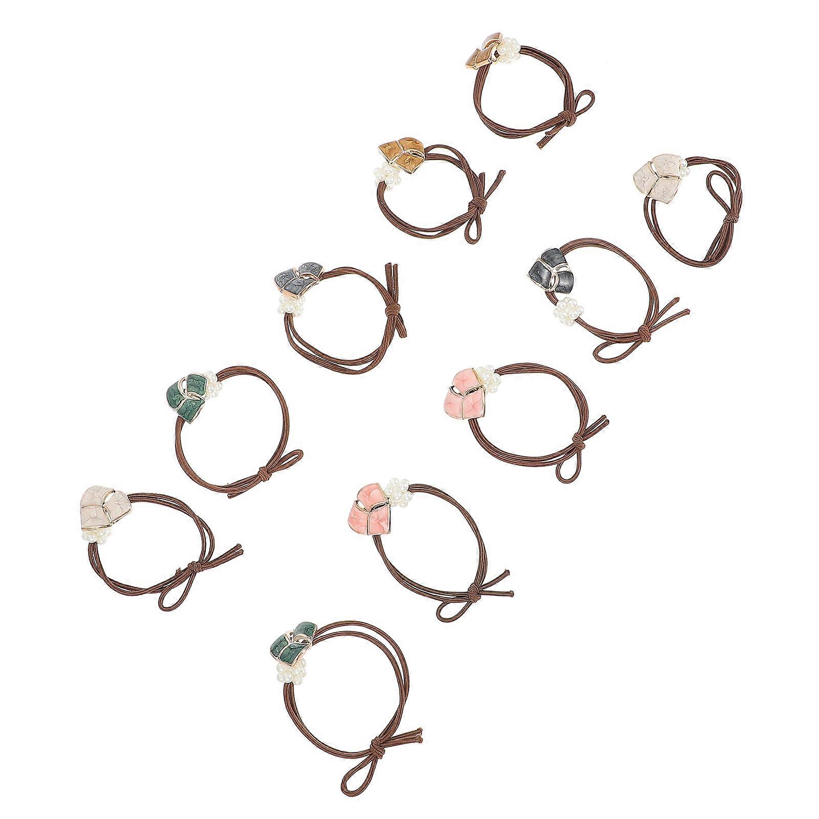 Here's a polished and professional product description for your **10pcs Elegant Pearl Elastic Hair Ties**:
### ✨ 10pcs Elegant Pearl Elastic Hair