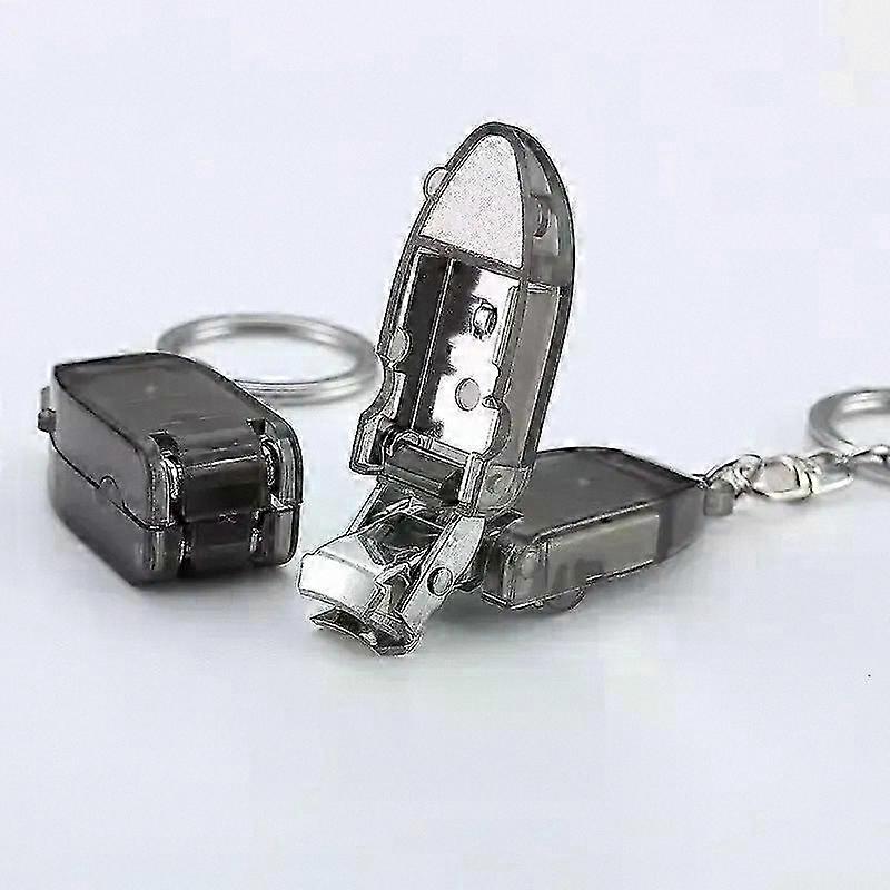 Mini Portable Nail Clipper with Plastic Handle and Key Ring for Convenient Grooming on the Go